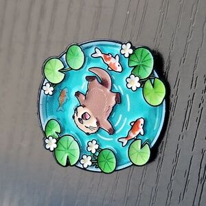 Otter in Koi Pond Enamel Pin
